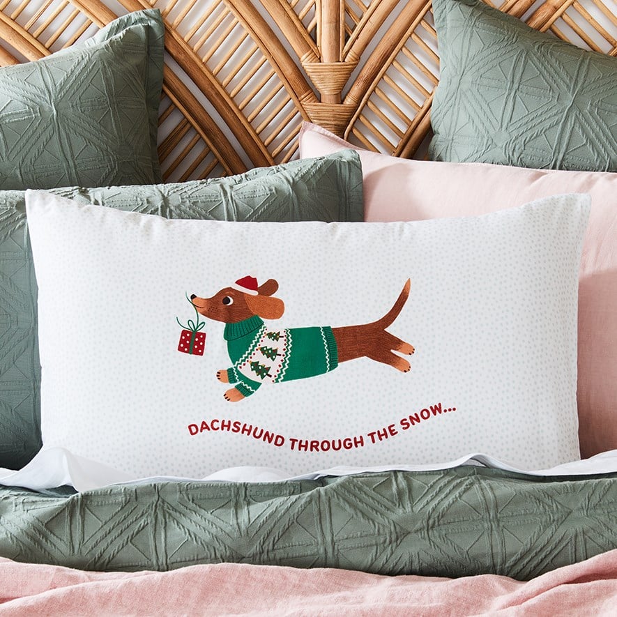 Dachshund through the snow hot sale pillow